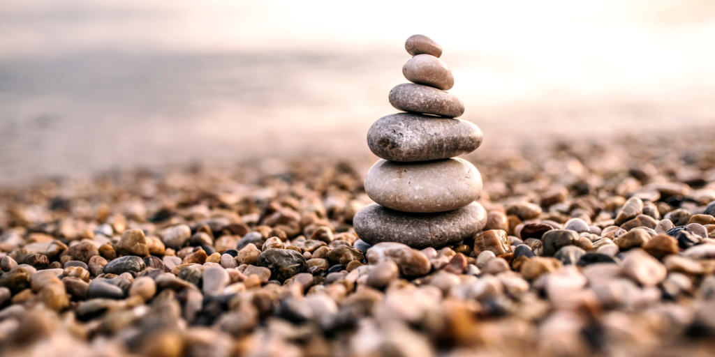 Stacked flat river stones.